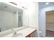 Bathroom with soaking tub, double vanity, and walk-in closet at 2158 Executive Dr, Duluth, GA 30096