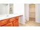 Bathroom with double vanity, walk-in shower, and large closet at 2158 Executive Dr, Duluth, GA 30096