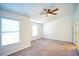Spacious bedroom with carpet and ceiling fan at 2158 Executive Dr, Duluth, GA 30096