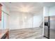 Bright dining room with hardwood floors and modern chandelier at 2158 Executive Dr, Duluth, GA 30096