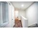 Upstairs hallway with carpeted floors and neutral walls at 2158 Executive Dr, Duluth, GA 30096