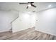 Bright living room with wood-look floors and ceiling fan at 2158 Executive Dr, Duluth, GA 30096