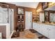 Main bathroom with double vanity, shower, and tile flooring at 326 Vinings Vintage Cir, Mableton, GA 30126