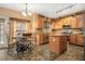 Kitchen with island, stainless steel appliances and breakfast nook at 326 Vinings Vintage Cir, Mableton, GA 30126