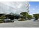 Modern glass building with a glass-covered entrance and driveway at 3630 Peachtree Ne Rd # 3106, Atlanta, GA 30326