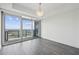 Bright living room with hardwood floors and balcony access at 3630 Peachtree Ne Rd # 3106, Atlanta, GA 30326