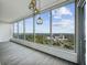 Modern dining area with hardwood floors and floor-to-ceiling windows with city views at 3630 Peachtree Ne Rd # 3106, Atlanta, GA 30326