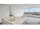 Modern kitchen island with marble countertop and gold faucet, offering city views at 3630 Peachtree Ne Rd # 3106, Atlanta, GA 30326