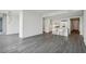 Open concept living space with hardwood floors and a view into the kitchen area at 3630 Peachtree Ne Rd # 3106, Atlanta, GA 30326