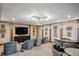 Elegant theater room boasts plush seating, a large screen, and a modern design at 3630 Peachtree Ne Rd # 3106, Atlanta, GA 30326