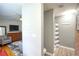 Clean bathroom with shower, toilet, and exposed brick feature at 680 Sherwood Dr, Jonesboro, GA 30236