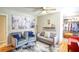 Serene living room with gray armchairs, sofa, and walk-in closet at 680 Sherwood Dr, Jonesboro, GA 30236