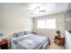 Spacious primary bedroom with a king-size bed and ample natural light at 680 Sherwood Dr, Jonesboro, GA 30236
