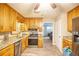 Updated kitchen featuring granite countertops and stainless steel appliances at 680 Sherwood Dr, Jonesboro, GA 30236
