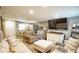 Finished basement with comfortable seating area, large TV, and plenty of storage at 680 Sherwood Dr, Jonesboro, GA 30236