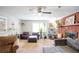 Spacious living room featuring a brick fireplace and ample natural light at 680 Sherwood Dr, Jonesboro, GA 30236