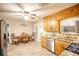 Bright kitchen with stainless steel appliances and granite countertops at 680 Sherwood Dr, Jonesboro, GA 30236