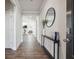 Bright and spacious entryway with wood-look floors and modern console table at 4011 Fallen Leaf Ct, Kennesaw, GA 30152