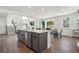 Modern kitchen with spacious island and access to backyard at 4011 Fallen Leaf Ct, Kennesaw, GA 30152