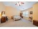 Large main bedroom with ceiling fan and ample space at 2085 Hasel St, Lawrenceville, GA 30044