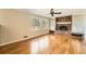 Gathering room with hardwood floors, fireplace, and built-in shelving at 2958 Applewood Ne Ct, Atlanta, GA 30345