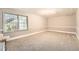 Spacious basement room with neutral decor and large window at 2958 Applewood Ne Ct, Atlanta, GA 30345