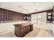 Home office featuring plaid wallpaper and a large desk at 2958 Applewood Ne Ct, Atlanta, GA 30345