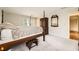 Main bedroom with a large four poster bed and carpet flooring at 2958 Applewood Ne Ct, Atlanta, GA 30345