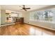 Gathering room with hardwood floors, large windows, and view of kitchen at 2958 Applewood Ne Ct, Atlanta, GA 30345