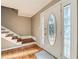 Bright entryway with hardwood floors, staircase, and an oval stained-glass door at 2958 Applewood Ne Ct, Atlanta, GA 30345