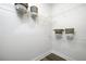 White closet with wire shelving and storage baskets at 3759 Tielman St, Snellville, GA 30078
