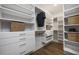Spacious walk-in closet with ample shelving and drawers at 3759 Tielman St, Snellville, GA 30078