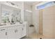 Elegant bathroom features a walk-in shower, built-in bench, and neutral tile at 3759 Tielman St, Snellville, GA 30078