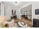 Sitting room with view into kitchen and open living area at 3759 Tielman St, Snellville, GA 30078