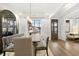 Bright dining room with hardwood floors and access to back porch at 3759 Tielman St, Snellville, GA 30078