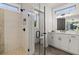 Bathroom with a large walk-in shower, a toilet, and double vanity at 3759 Tielman St, Snellville, GA 30078