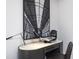 Home office features a modern desk with a large black and white art print at 3759 Tielman St, Snellville, GA 30078