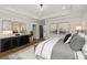 Main bedroom with a king bed, stylish dresser, and calming decor at 3759 Tielman St, Snellville, GA 30078