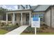 Brick and siding house exterior with a covered porch at 3759 Tielman St, Snellville, GA 30078