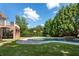 Freeform pool and spa in a private backyard setting at 3993 N Ivy Ne Rd, Atlanta, GA 30342