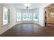 Bright dining room with hardwood floors and bay windows at 3993 N Ivy Ne Rd, Atlanta, GA 30342