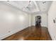 Spacious living room featuring hardwood floors and an arched entryway at 3685 Peachtree Ne Rd # 4, Atlanta, GA 30319