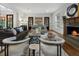 Living room with fireplace, hardwood floors, and French doors at 1015 Nawench Dr, Atlanta, GA 30327