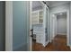 View of a home office through a frosted glass sliding door at 1015 Nawench Dr, Atlanta, GA 30327