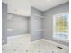Large walk-in closet with wire shelving at 5955 Tibor Nw Dr, Acworth, GA 30101