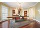 Formal dining room with hardwood floors and built-in cabinetry at 5955 Tibor Nw Dr, Acworth, GA 30101
