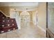 Two-story foyer with hardwood floors and elegant staircase at 5955 Tibor Nw Dr, Acworth, GA 30101