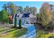 Stunning home with a circular driveway and lush landscaping at 5955 Tibor Nw Dr, Acworth, GA 30101