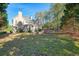 House exterior showcasing backyard and landscaping at 5955 Tibor Nw Dr, Acworth, GA 30101