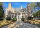 Elegant house exterior with stone accents and landscaping at 5955 Tibor Nw Dr, Acworth, GA 30101